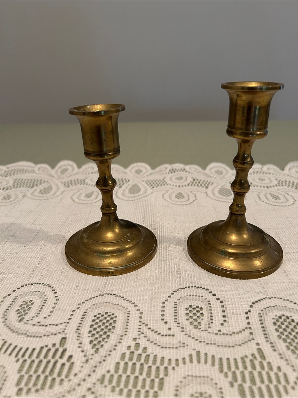 Set of 2 Brass Candle Holders with twisted taper candles. See pics for sizes